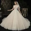 Vintage / Originale Champagne Transparentes La Mariée Robe De Mariée 2020 Robe Boule Col Haut Manches Courtes Dos Nu Glitter Appliques En Dentelle Perlage Cathedral Train Volants