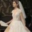 Vintage / Originale Champagne Transparentes La Mariée Robe De Mariée 2020 Robe Boule Col Haut Manches Courtes Dos Nu Glitter Appliques En Dentelle Perlage Cathedral Train Volants