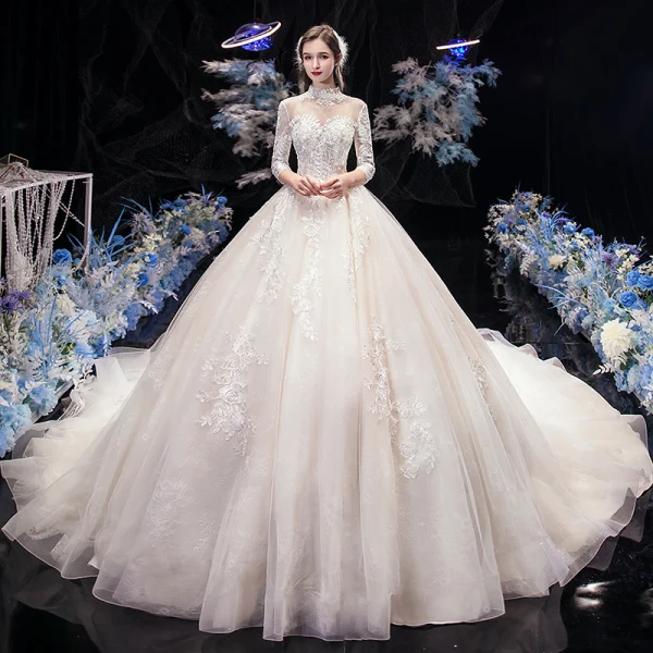 Vintage / Retro Champagne See-through Wedding Dresses 2020 Ball Gown High Neck 3/4 Sleeve Backless Flower Appliques Lace Beading Pearl Cathedral Train