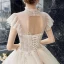 Vintage / Originale Champagne Transparentes La Mariée Robe De Mariée 2020 Robe Boule Col Haut Sans Manches Dos Nu Perlage Appliques En Dentelle Paillettes Cathedral Train Volants