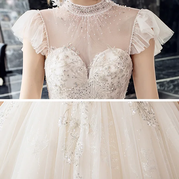 Vintage / Originale Champagne Transparentes La Mariée Robe De Mariée 2020 Robe Boule Col Haut Sans Manches Dos Nu Perlage Appliques En Dentelle Paillettes Cathedral Train Volants