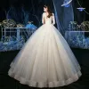 Luxury / Gorgeous Champagne See-through Outdoor / Garden Wedding Dresses 2020 Ball Gown V-Neck 3/4 Sleeve Backless Appliques Lace Beading Glitter Tulle Floor-Length / Long Ruffle