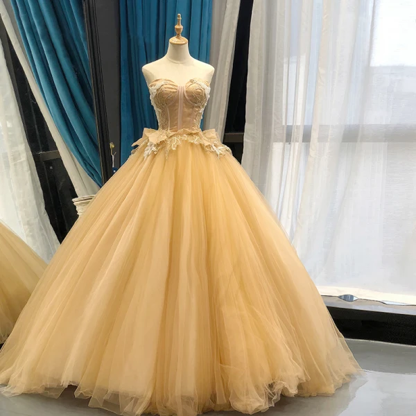High-end Champagne Dancing Ballkjoler 2023 Ballkjole Kjæreste Uten Ermer Appliques Blonder Beading Lange Buste Ryggløse Formelle Kjoler