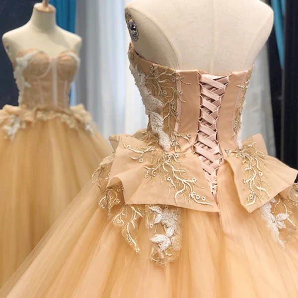 High-end Champagne Dancing Ballkjoler 2023 Ballkjole Kjæreste Uten Ermer Appliques Blonder Beading Lange Buste Ryggløse Formelle Kjoler