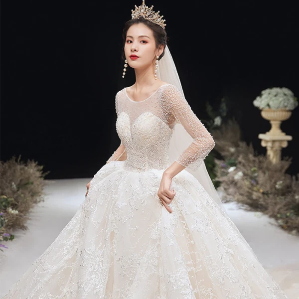 Romantic Champagne See-through Bridal Wedding Dresses 2020 Ball Gown Scoop Neck 3/4 Sleeve Backless Appliques Lace Handmade Beading Cathedral Train Ruffle