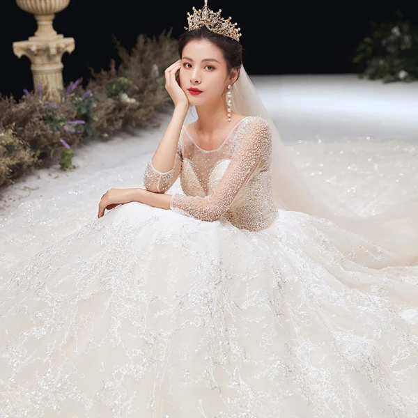 Romantic Champagne See-through Bridal Wedding Dresses 2020 Ball Gown Scoop Neck 3/4 Sleeve Backless Appliques Lace Handmade Beading Cathedral Train Ruffle