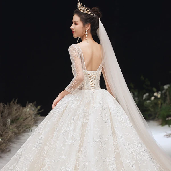 Romantic Champagne See-through Bridal Wedding Dresses 2020 Ball Gown Scoop Neck 3/4 Sleeve Backless Appliques Lace Handmade Beading Cathedral Train Ruffle