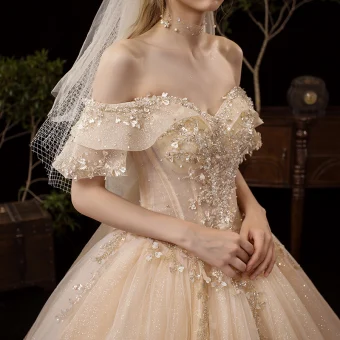 Best Champagne Bridal Wedding Dresses 2020 Ball Gown Off The Shoulder Short Sleeve Backless Glitter Tulle Appliques Flower Beading Cathedral Train Ruffle