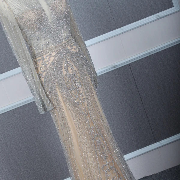 Haut de Gamme Champagne Gris Transparentes Robe De Soirée 2020 Trompette / Sirène Encolure Dégagée Manches Longues Fait main Perlage Train De Balayage Robe De Ceremonie
