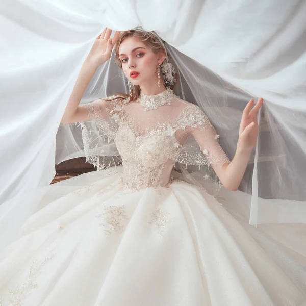 Vintage / Retro Champagne See-through Bridal Wedding Dresses With Shawl 2020 Ball Gown High Neck Sleeveless Backless Glitter Tulle Flower Appliques Lace Beading Cathedral Train Ruffle