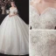 Chic / Belle Champagne La Mariée Robe De Mariée 2020 Robe Boule De l'épaule Manches Courtes Dos Nu Glitter Tulle Appliques En Dentelle Paillettes Perlage Cathedral Train Volants