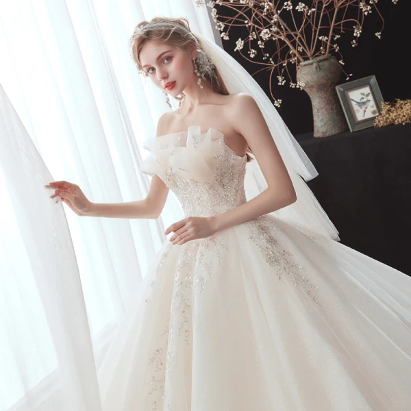 Chic / Beautiful Champagne Bridal Wedding Dresses 2020 Ball Gown Strapless Sleeveless Backless Appliques Sequins Beading Glitter Tulle Cathedral Train Ruffle