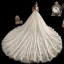 Luxe Champagne Transparentes Robe De Mariée 2020 Robe Boule Encolure Dégagée Manches Courtes Dos Nu Perlage Glitter Tulle Appliques En Dentelle Cathedral Train Volants