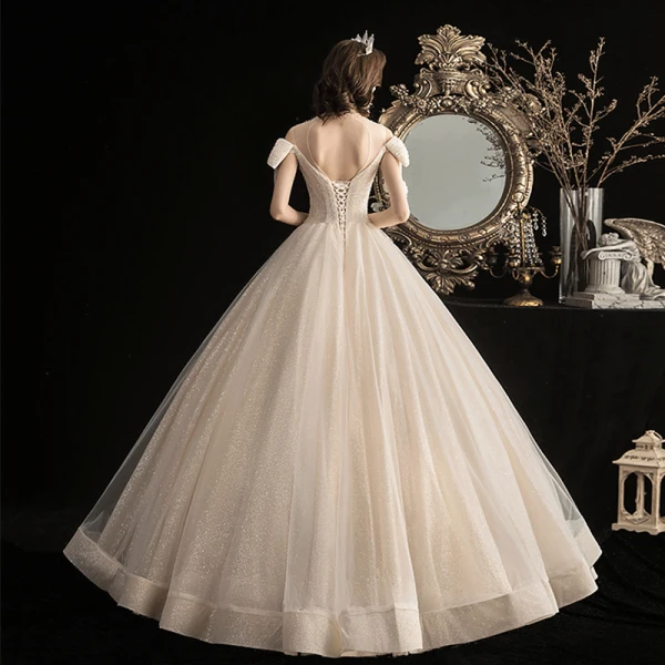 Chic / Beautiful Champagne Outdoor / Garden Wedding Dresses 2020 A-Line / Princess Scoop Neck Bow Short Sleeve Backless Beading Tassel Glitter Tulle Floor-Length / Long Ruffle