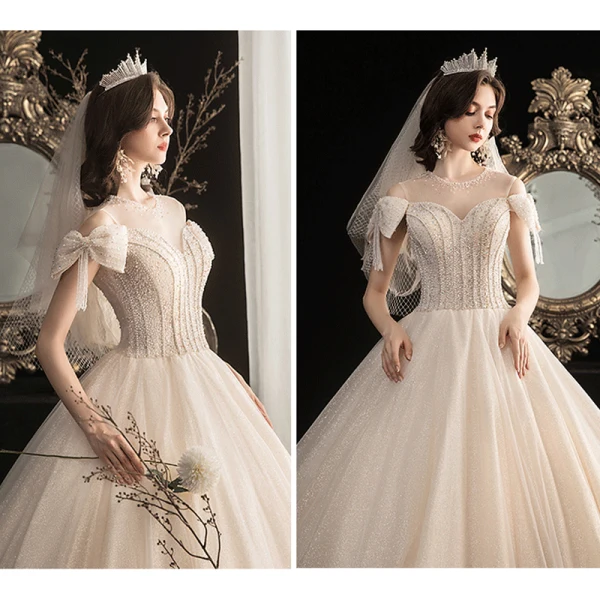 Chic / Beautiful Champagne Outdoor / Garden Wedding Dresses 2020 A-Line / Princess Scoop Neck Bow Short Sleeve Backless Beading Tassel Glitter Tulle Floor-Length / Long Ruffle