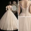 Chic / Beautiful Champagne Outdoor / Garden Wedding Dresses 2020 A-Line / Princess Scoop Neck Bow Short Sleeve Backless Beading Tassel Glitter Tulle Floor-Length / Long Ruffle