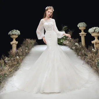 Style Victorien Ivoire La Mariée Robe De Mariée 2020 Trompette Sirène Transparentes Encolure Dégagée Gonflée Manches Longues Dos Nu Appliques Fleur Glitter Tulle Chapel Train Volants