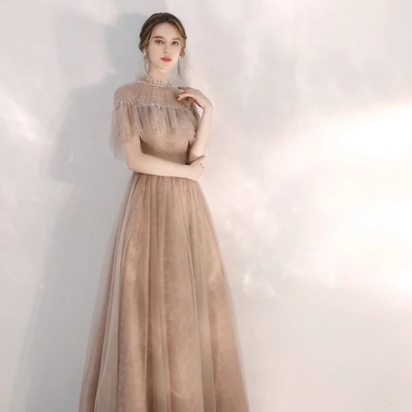 Vintage / Originale Champagne Robe De Soirée 2020 Princesse Col Haut Manches Courtes Perlage Longue Volants Dos Nu Robe De Ceremonie