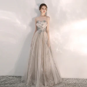 Elegant Champagne Selskapskjoler 2020 Prinsesse Kjæreste Uten Ermer Beading Glitter Tyll Lange Buste Ryggløse Formelle Kjoler