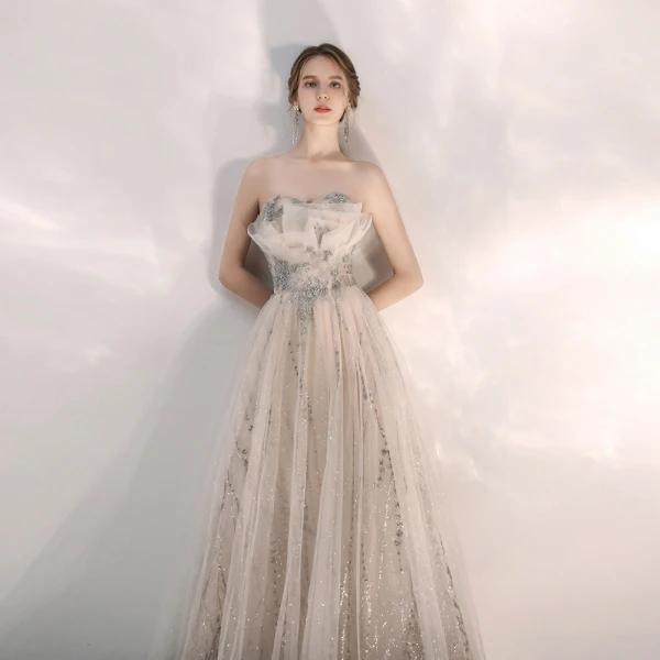 Elegant Champagne Selskapskjoler 2020 Prinsesse Kjæreste Uten Ermer Beading Glitter Tyll Lange Buste Ryggløse Formelle Kjoler