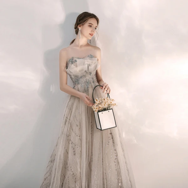 Elegant Champagne Selskapskjoler 2020 Prinsesse Kjæreste Uten Ermer Beading Glitter Tyll Lange Buste Ryggløse Formelle Kjoler