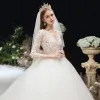 Illusion Ivory See-through Pregnant Wedding Dresses 2020 Empire V-Neck 3/4 Sleeve Backless Pierced Appliques Lace Beading Chapel Train Ruffle