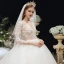 Illusion Ivoire Transparentes Enceinte Robe De Mariée 2020 Empire V-Cou 3/4 Manches Dos Nu Percé Appliques En Dentelle Perlage Chapel Train Volants