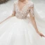 Illusion Ivoire Transparentes Enceinte Robe De Mariée 2020 Empire V-Cou 3/4 Manches Dos Nu Percé Appliques En Dentelle Perlage Chapel Train Volants