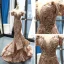 Scintillantes Doré Paillettes Tapis rouge Robe De Soirée 2023 Trompette / Sirène De l'épaule Manches Courtes Appliques Fleur Perlage Plumes Tribunal Train Dos Nu