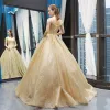 High-end Gold Dancing Prom Dresses 2023 Ball Gown Shoulders Sleeveless Glitter Tulle Floor-Length / Long Ruffle Backless Formal Dresses