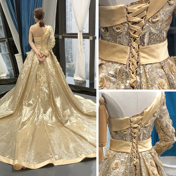 Glitzernden Gold Pailletten Roter Teppich Abendkleider 2023 A Linie One-Shoulder Lange Ärmel Stoffgürtel Applikationen Blumen Perlenstickerei Kapelle-Schleppe Rüschen Rückenfreies