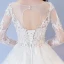 Abordable Blanche Percé Robe De Mariée 2017 Robe Boule Encolure Dégagée Manches Longues Dos Nu Appliques En Dentelle Longue