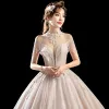 Luxury / Gorgeous Champagne See-through Wedding Dresses 2018 Ball Gown High Neck Short Sleeve Backless Appliques Lace Beading Tassel Glitter Tulle Royal Train Ruffle