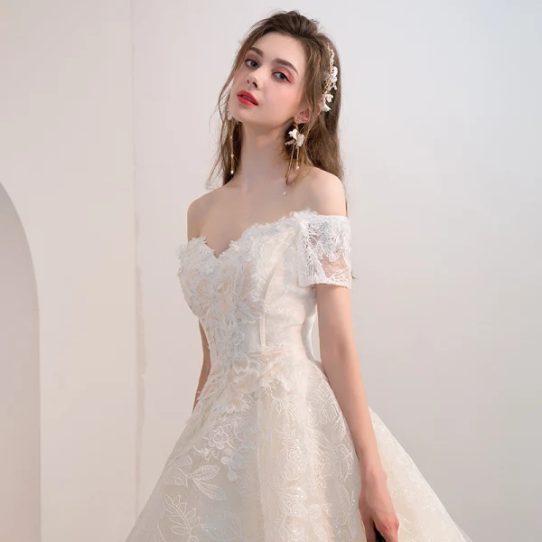 Bling Bling Champagne Wedding Dresses 2018 Ball Gown Off-The-Shoulder Short Sleeve Backless Glitter Lace Cathedral Train Ruffle