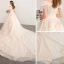 Élégant Champagne Robe De Mariée 2018 Princesse De l'épaule Dos Nu Manches Courtes Perlage Gland Appliques En Dentelle Cathedral Train Volants