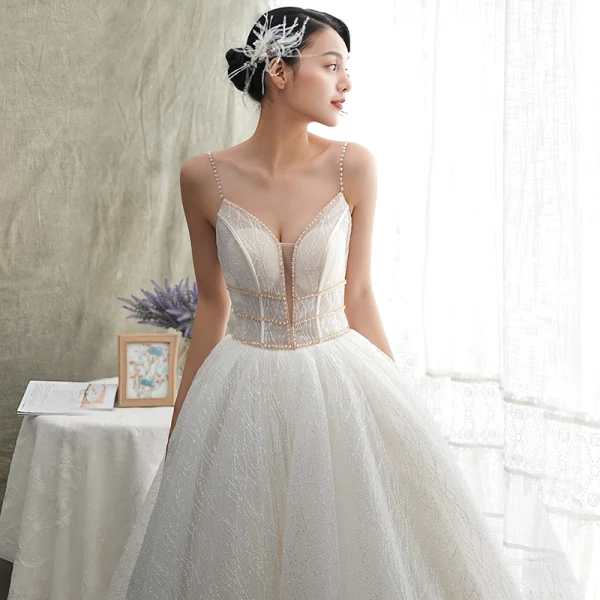 Luxury / Gorgeous Ivory Wedding Dresses 2019 A-Line / Princess Spaghetti Straps Sleeveless Backless Beading Pearl Glitter Tulle Court Train Ruffle