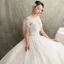 Luxus / Herrlich Champagner Durchsichtige Brautkleider / Hochzeitskleider 2019 A Linie Rundhalsausschnitt Kurze Ärmel Rückenfreies Feder Applikationen Spitze Glanz Tülle Perlenstickerei Quaste Kathedrale Schleppe Rüschen