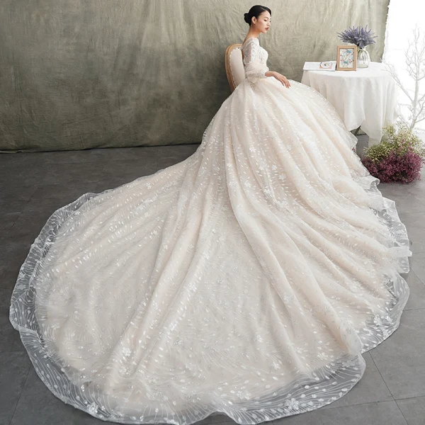 Luxury / Gorgeous Champagne See-through Wedding Dresses 2019 A-Line / Princess Scoop Neck Puffy Long Sleeve Backless Glitter Tulle Appliques Lace Beading Cathedral Train Ruffle