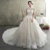 Luxury / Gorgeous Champagne See-through Wedding Dresses 2019 Princess High Neck Short Sleeve Backless Appliques Lace Beading Tassel Glitter Tulle Cathedral Train Ruffle