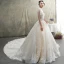 Luxe Champagne Transparentes Robe De Mariée 2019 Princesse Col Haut Manches Courtes Dos Nu Appliques En Dentelle Perlage Gland Glitter Tulle Cathedral Train Volants