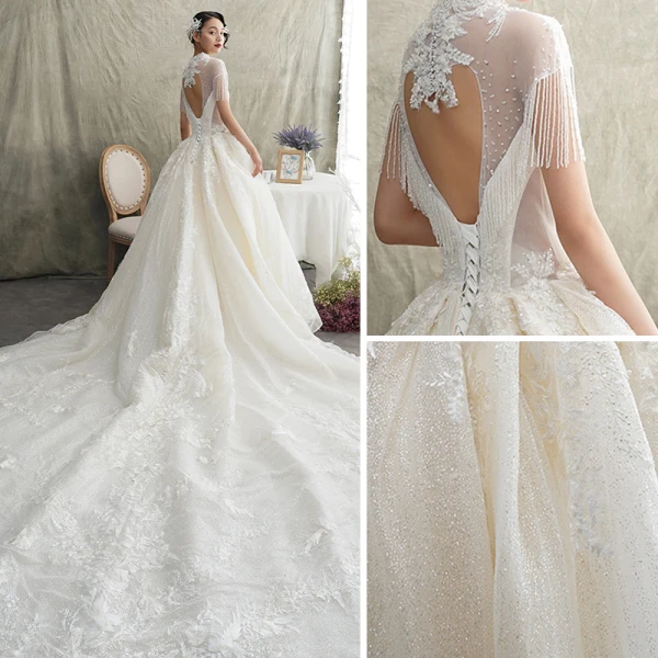 Luxe Champagne Transparentes Robe De Mariée 2019 Princesse Col Haut Manches Courtes Dos Nu Appliques En Dentelle Perlage Gland Glitter Tulle Cathedral Train Volants