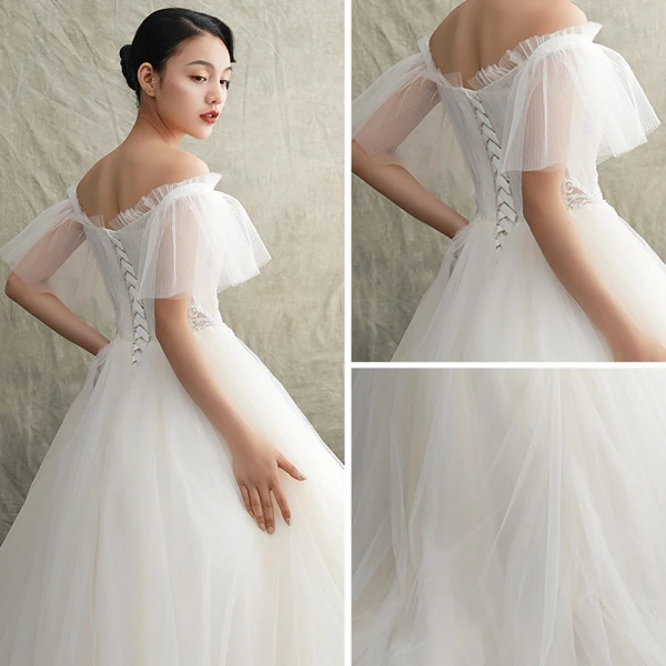 Elegante Ivory / Creme Durchsichtige Brautkleider / Hochzeitskleider 2019 Prinzessin Off Shoulder Kurze Ärmel Rückenfreies Perlenstickerei Sweep / Pinsel Zug Rüschen