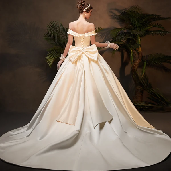 Vintage / Retro Ivory Satin Winter Wedding Dresses 2019 Ball Gown Off-The-Shoulder Short Sleeve Backless Bow Cathedral Train Ruffle