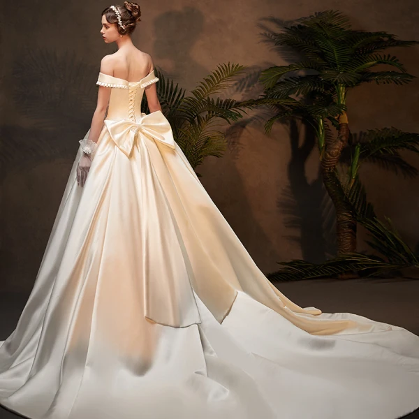 Vintage / Retro Ivory Satin Winter Wedding Dresses 2019 Ball Gown Off-The-Shoulder Short Sleeve Backless Bow Cathedral Train Ruffle