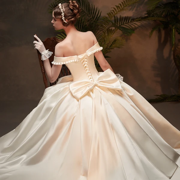 Vintage / Retro Ivory Satin Winter Wedding Dresses 2019 Ball Gown Off-The-Shoulder Short Sleeve Backless Bow Cathedral Train Ruffle
