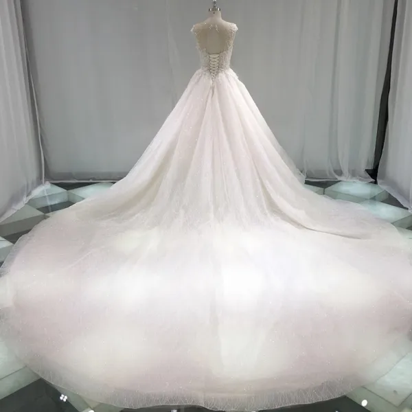 Élégant Champagne Transparentes Robe De Mariée 2019 Princesse Encolure Dégagée Sans Manches Dos Nu Appliques En Dentelle Perle Perlage Glitter Tulle Cathedral Train Volants