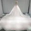 Élégant Champagne Transparentes Robe De Mariée 2019 Princesse Encolure Dégagée Sans Manches Dos Nu Appliques En Dentelle Perle Perlage Glitter Tulle Cathedral Train Volants