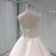 Élégant Champagne Transparentes Robe De Mariée 2019 Princesse Encolure Dégagée Sans Manches Dos Nu Appliques En Dentelle Perle Perlage Glitter Tulle Cathedral Train Volants