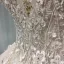 Élégant Champagne Transparentes Robe De Mariée 2019 Princesse Encolure Dégagée Sans Manches Dos Nu Appliques En Dentelle Perle Perlage Glitter Tulle Cathedral Train Volants