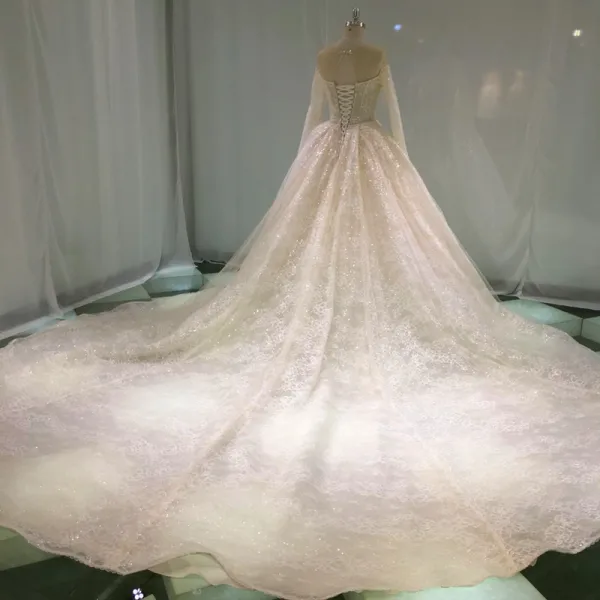 Luxury / Gorgeous Champagne See-through Wedding Dresses 2019 Princess Scoop Neck Long Sleeve Backless Appliques Lace Pearl Beading Glitter Tulle Cathedral Train Ruffle